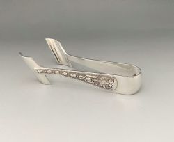 A CHARMING PAIR OF SILVER 'SOLO' ASPARAGUS TONGS BY GARRARD CO