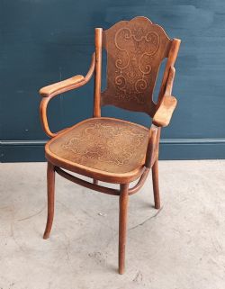 A THONET BENTWOOD ARM CHAIR NO 70 1905