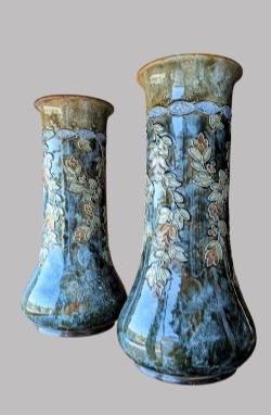 A PAIR OF ART NOUVEAU ROYAL DOULTON LAMBETH STONEWARE VASES