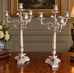 A PAIR OF VICTORIAN SILVER PLATED CANDLESTICKS CANDELABRAS