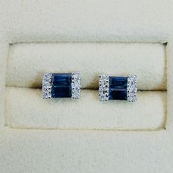 9CT WHITE GOLD EMERALD CUT SAPPHIRES AND DIAMOND CLUSTER STUD EARRINGS