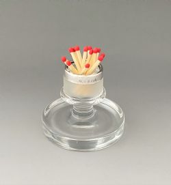 AN UNUSUAL EDWARDIAN SILVER MOUNTED MATCH STRIKER