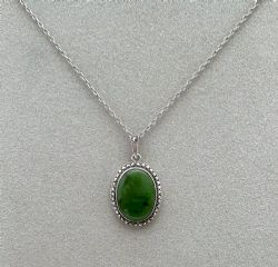 A CHARMING ART DECO SILVER JADE PENDANT