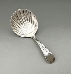 A CHARMING 18TH CENTURY SILVER CADDY SPOON