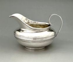 A STYLISH GEORGE IV SILVER CREAM JUG