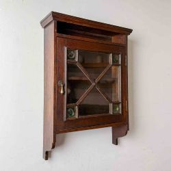 SMALL ARTS AND CRAFTS OAK WALL CABINET WITH GLAZED DOOR