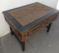 ANTIQUE AND UNUSUAL EBONIZED AND DECORATED TRUNK ON STAND