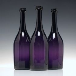 THREE VICTORIAN AMETHYST GLASS WINE SERVING BOTTLES C1860