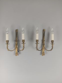 PAIR OF FRENCH ANTIQUE TWIN ARM GILDED BRASS RIBBON WALL LIGHTS