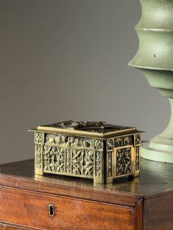 A PROFUSELY DECORATED GOTHIC REVIVAL BRASS CASKET SECOND HALF 19TH CENTURY