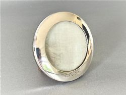 A GEORGE V MINIATURE SILVER SWEETHEART FRAME