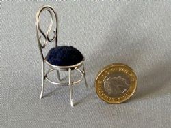 A RARE VICTORIAN NOVELTY SILVER 'SALON CHAIR' PIN CUSHION