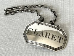 A HANDSOME GEORGIAN SILVER CLARET LABEL