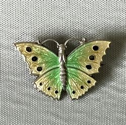 A PETITE SILVER GUILLOCHE ENAMEL BUTTERFLY BROOCH