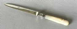 A LOVELY SILVER MOUNTED MOTHEROFPEARL LETTER OPENER