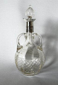 A GORGEOUS EDWARDIAN SILVER MOUNTED CUT GLASS DECANTER