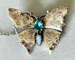 A SUPERB VICTORIAN SILVER ROSE GOLD BUTTERFLY BROOCH
