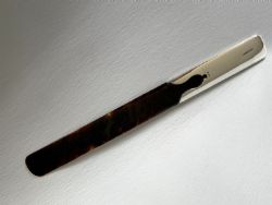 A HANDSOME EDWARDIAN SILVER TORTOISESHELL PAGE TURNER