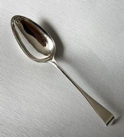 A LARGE 18TH CENTURY NEWCASTLE SILVER SERVING SPOON