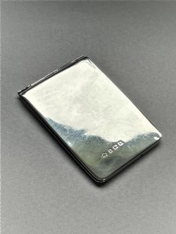 A LOVELY EDWARDIAN SILVER WALLET STAMP CASE