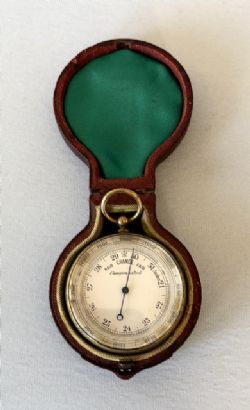 A SUPERB EDWARDIAN CASED BRASS POCKET BAROMETERALTIMETER