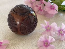 AN IRISH ANTIQUE PUZZLE BALL FOR SNUFF ROUGE COINS ETC