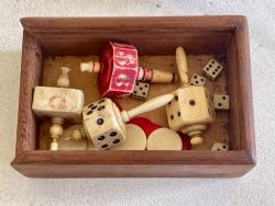 A COLLECTION OF ANTIQUE BONE PRISONER OF WAR TEETOTUMS
