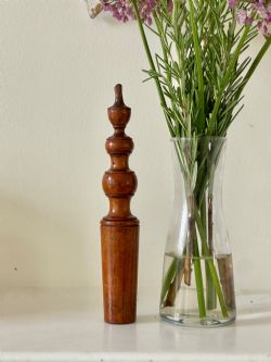 AN ANTIQUE TREEN TOY A CHILDS RATTLE