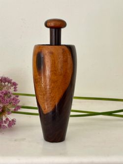 AN ANTIQUE TREEN SNUFF MORTAR AND PESTLE