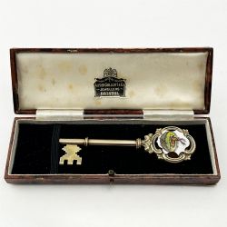 COMMEMORATIVE STERLING SILVER AND ENAMEL KEY
