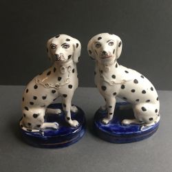 A PAIR OF VICTORIAN STAFFORDSHIRE DALMATIANS