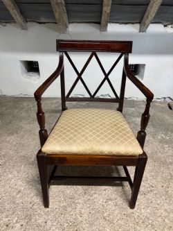 A REGENCY MAHOGANY BAR BACK ELBOW CHAIR