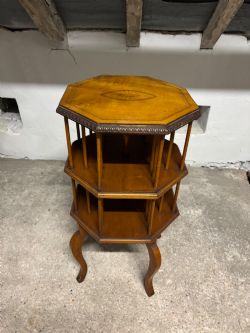 AN EDWARDIAN SATINWOOD AND INLAID REVOLVING BOOKCASE