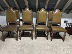 A SET OF EIGHT OAK 17THC STYLE DINING CHAIRS