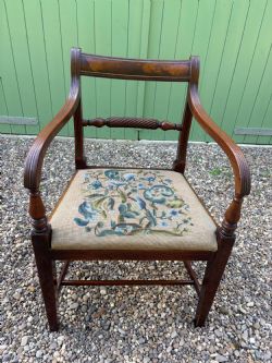 A REGENCY MAHOGANY DESKARMCHAIR
