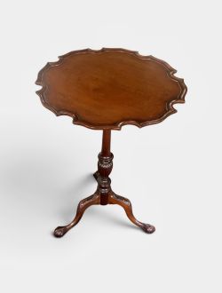 SMALL MAHOGANY TRIPOD TABLE WITH SHAPED PIE CRUST RIM