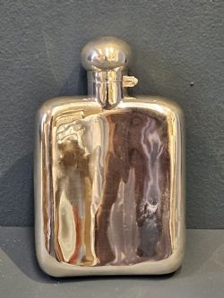 GEORGE V CURVED SILVER HIP FLASK