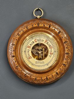 EDWARDIAN WALNUT CASED ANEROID BAROMETER BY WILSON BURY ST EDMONDS