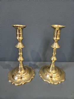 PAIR OF GEORGE III BRASS PETAL BASE CANDLESTICKS