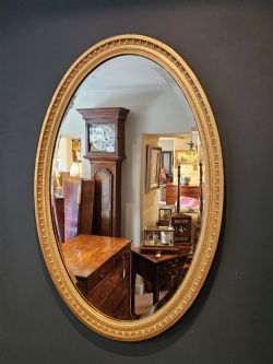 VICTORIAN OVAL PLASTER GILT MIRROR