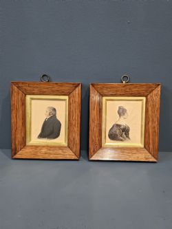 PAIR OF EARLY VICTORIAN ROSEWOOD FRAMED MINIATURE PORTRAITS