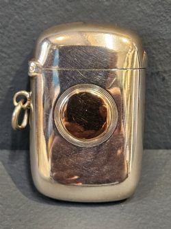 SILVER AND 9CT GOLD VESTA