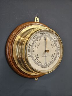 LATE VICTORIAN BRASS BULK HEAD BAROMETER BY BARKERS OF KENSINGTON