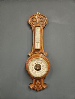 SMALL SKELETONISED MOVEMENT BANJO BAROMETER WITH PORCELAIN DIAL
