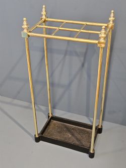 EDWARDIAN BRASS FRAMED STICK STAND WITH CAST IRON BASE