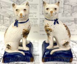 PAIR OF STAFFORDSHIRE CAT FIGURES