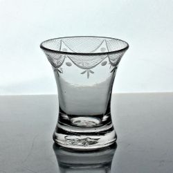 GEORGIAN SMALL SWAG AND TAIL ENGRAVED FIRING GLASS