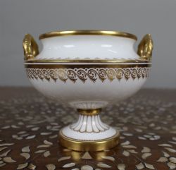 19TH CENTURY ENGLISH WHITE GILT TWOHANDLED PORCELAIN URN