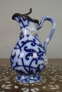 VICTORIAN FLOW BLUE RELIEFMOULDED JUG WITH PEWTER LID C1850