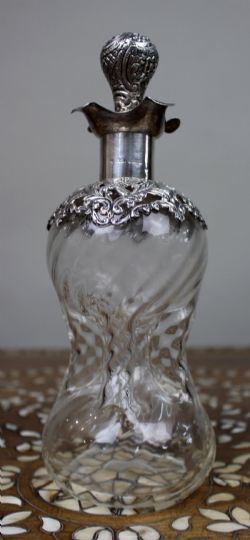 ANTIQUE SILVER MOUNTED CRYSTAL DECANTER